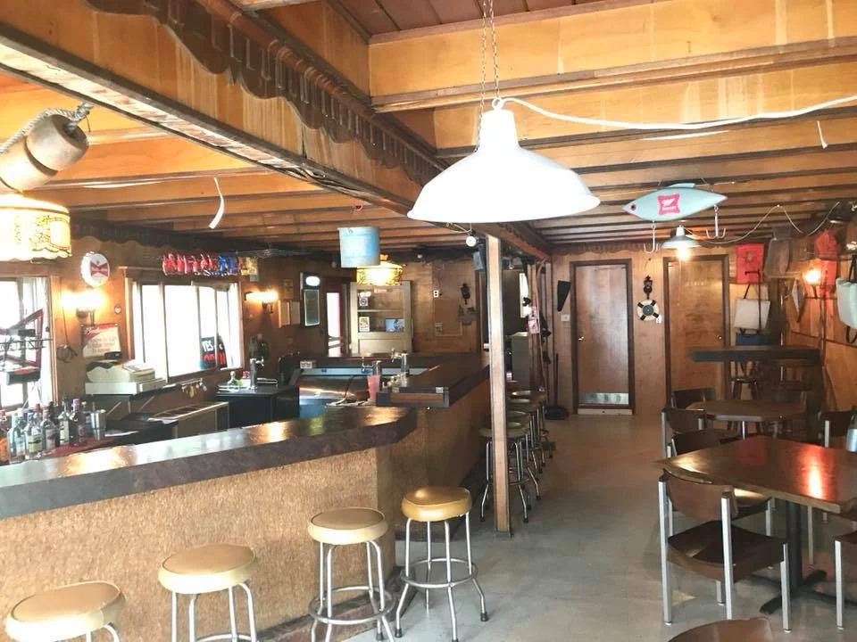 Wood-paneled Robinson Lake Resort bar interior